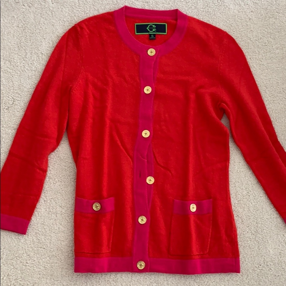 red and pink cardigan